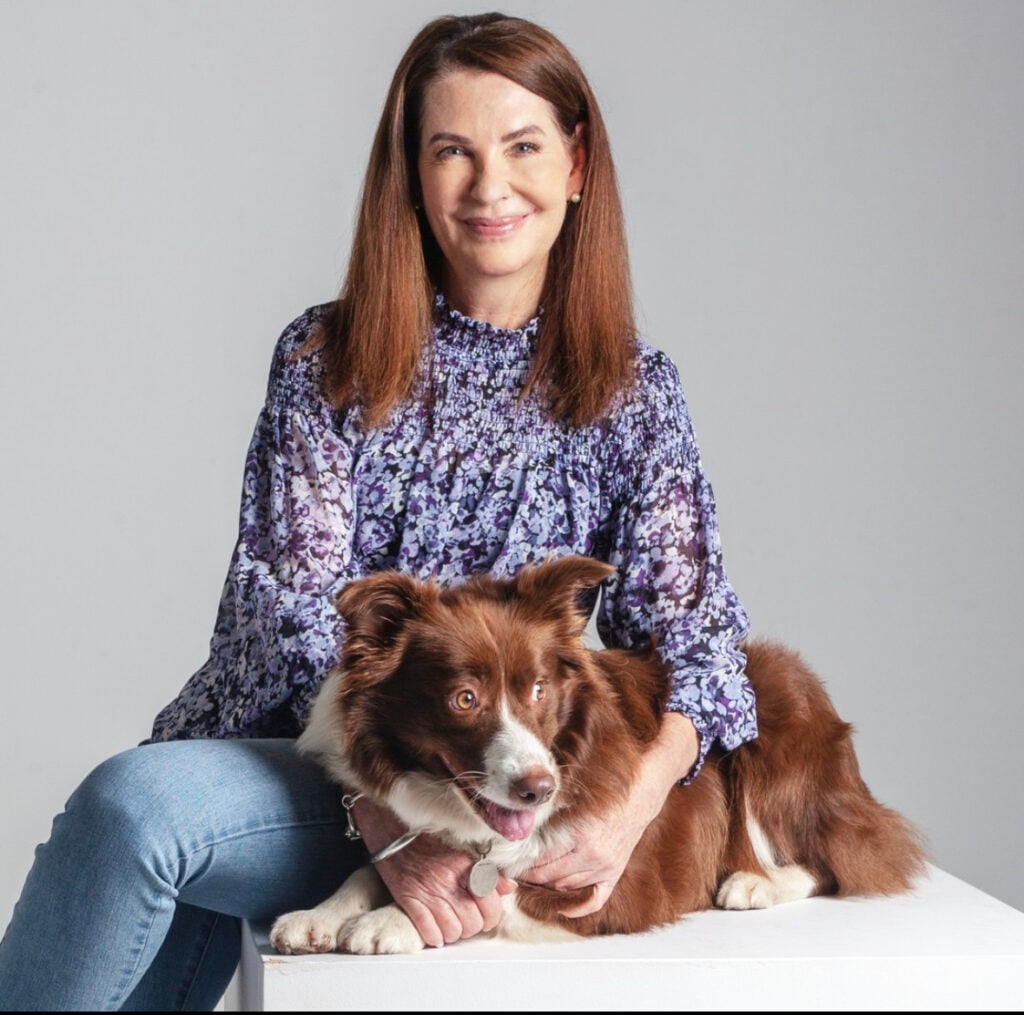 Replenish Co cosmetic nurse with dog in clinic